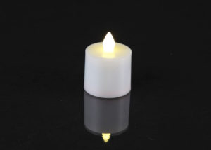 Spare warm white remote controlled rechargeable tea light candles